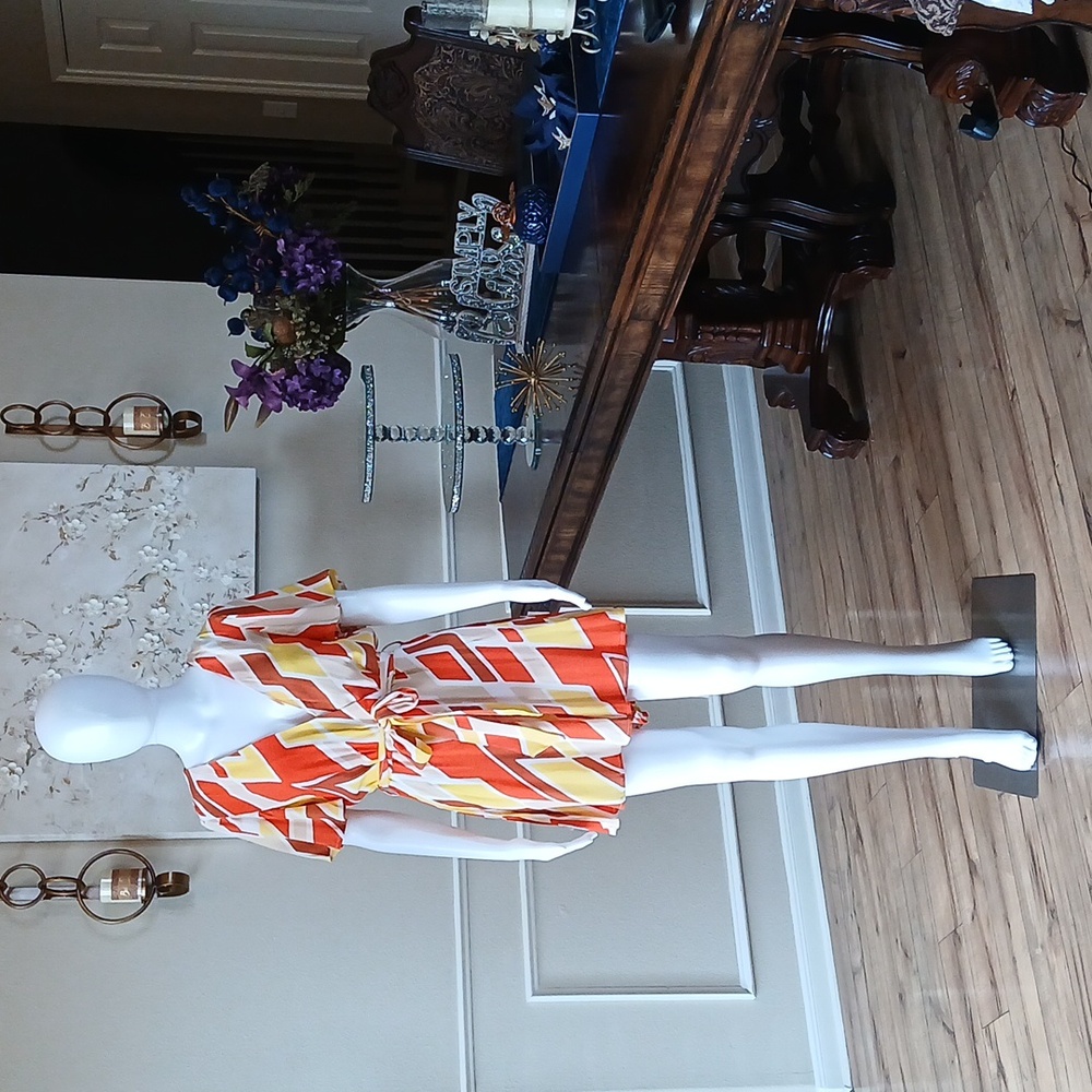 New Vibrant Orange and Yellow Patterned Wrap Mini Rorper. Size L - Picture 4 of 17